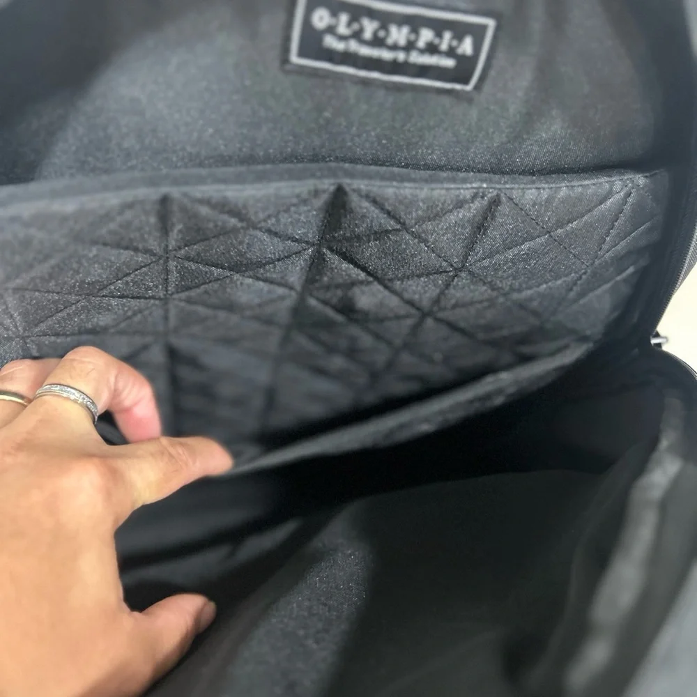 Compact Black Men's Backpack with Subtle Red Accents
